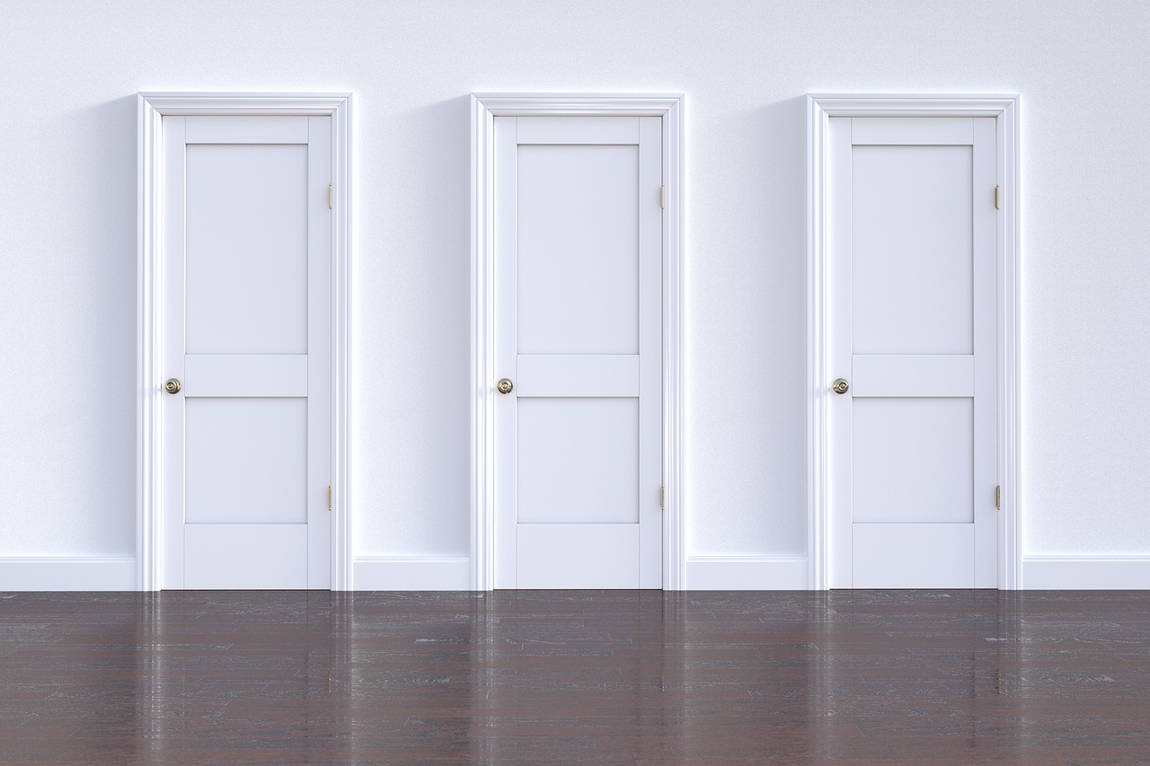 Three white doors