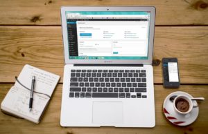 Laptop on desk - tips for boosting SEO