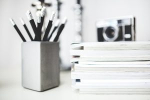Stack of Magazines & Pencils - Proofreading Tips